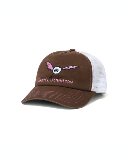 BUTTER GOODS | DANIEL JOHNSTON Eye Trucker Cap - Brown
