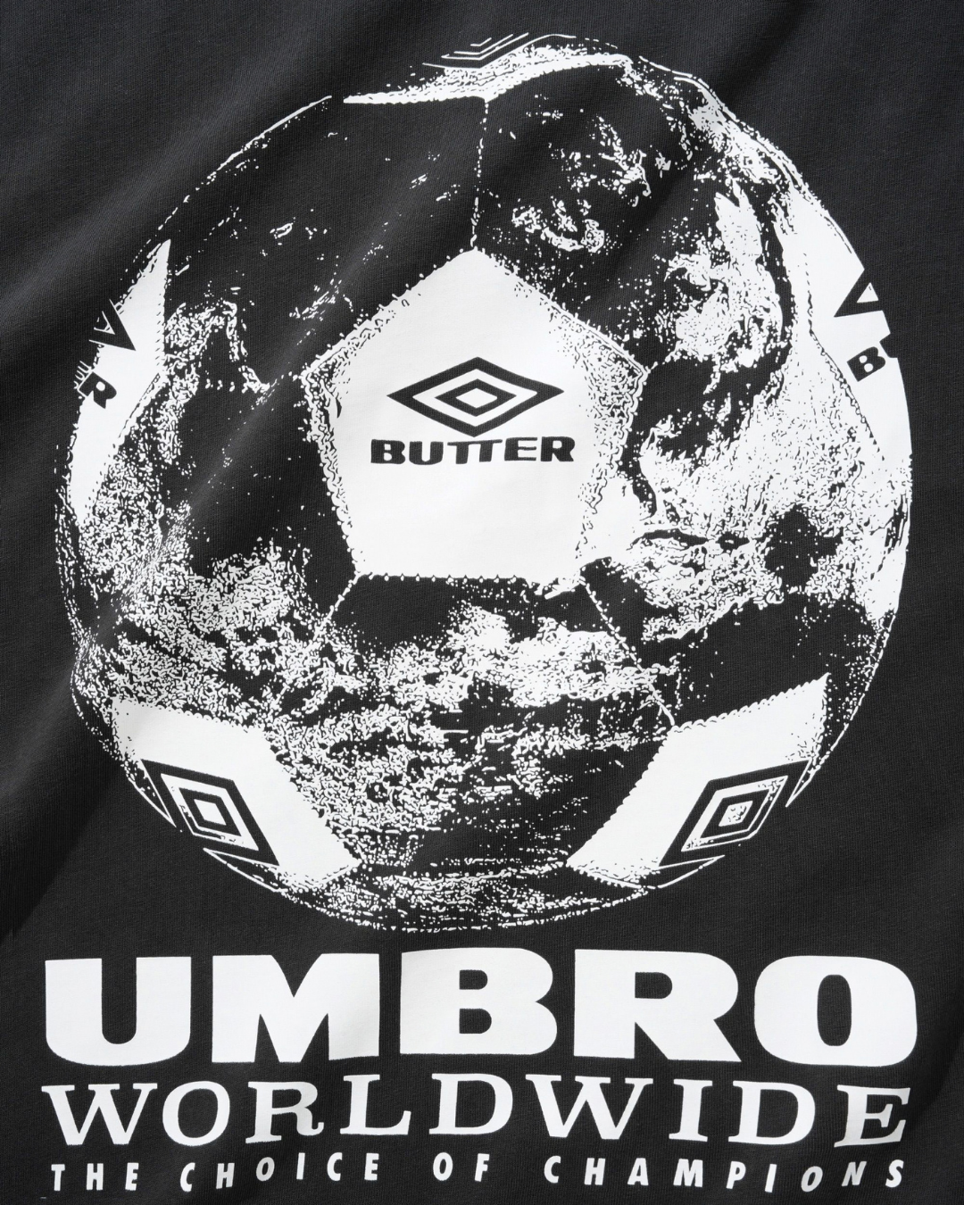 BUTTER GOODS | UMBRO World Game Tee - Washed Black