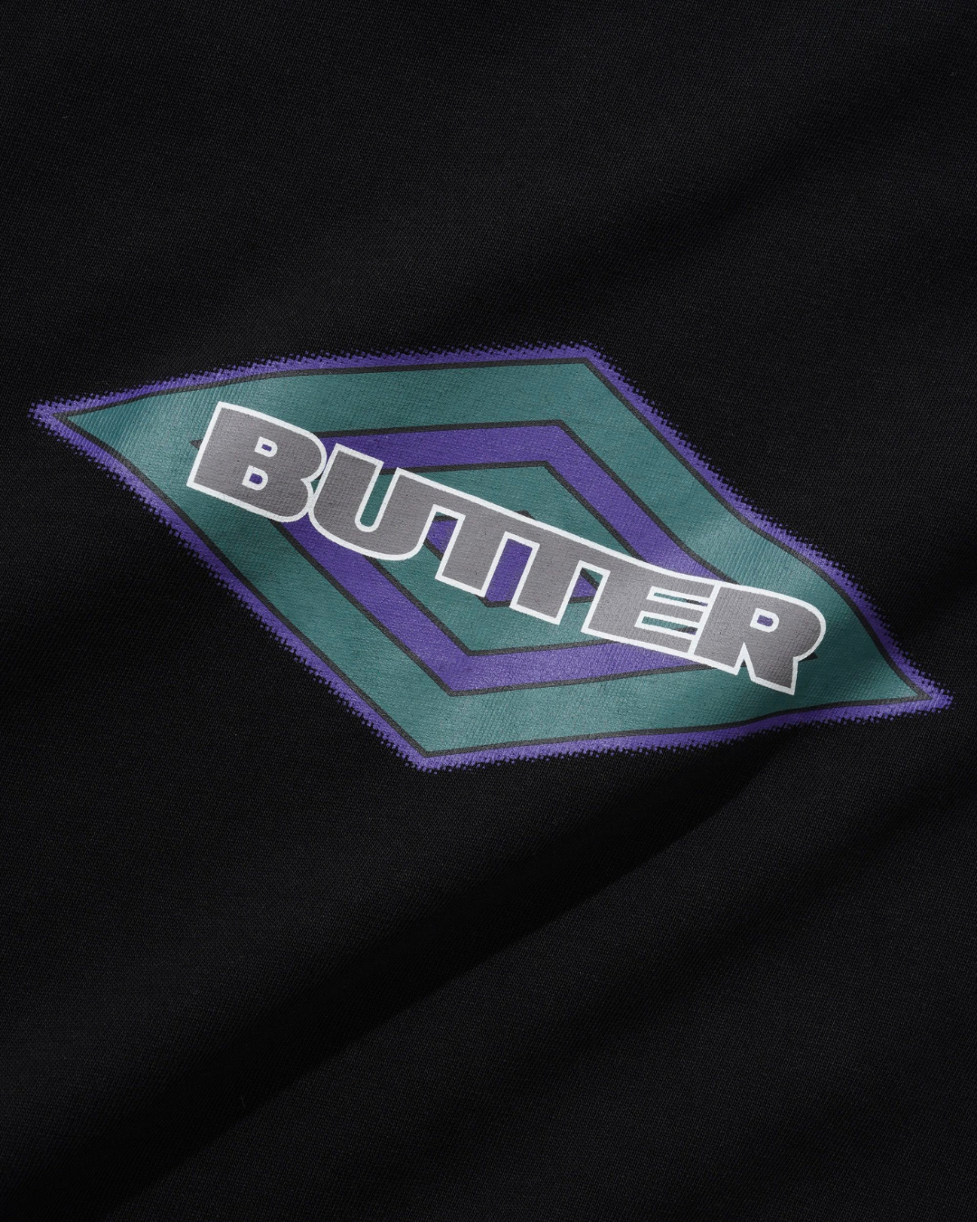 BUTTER GOODS | UMBRO Diamond Logo Tee - Black