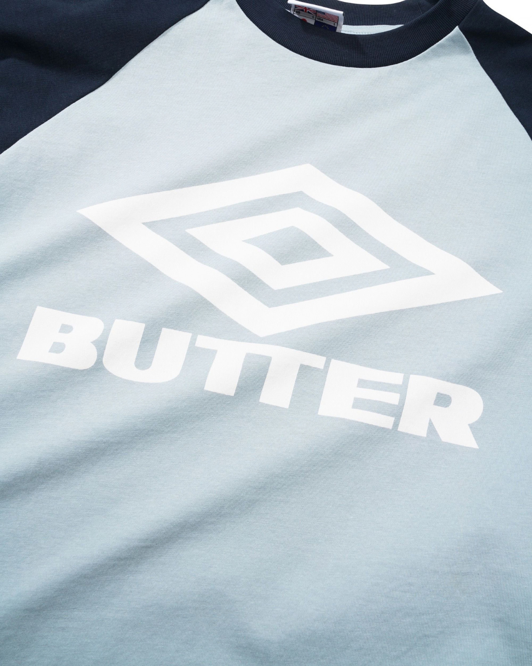 BUTTER GOODS | UMBRO Diamond Logo Raglan Tee - Slate/Navy