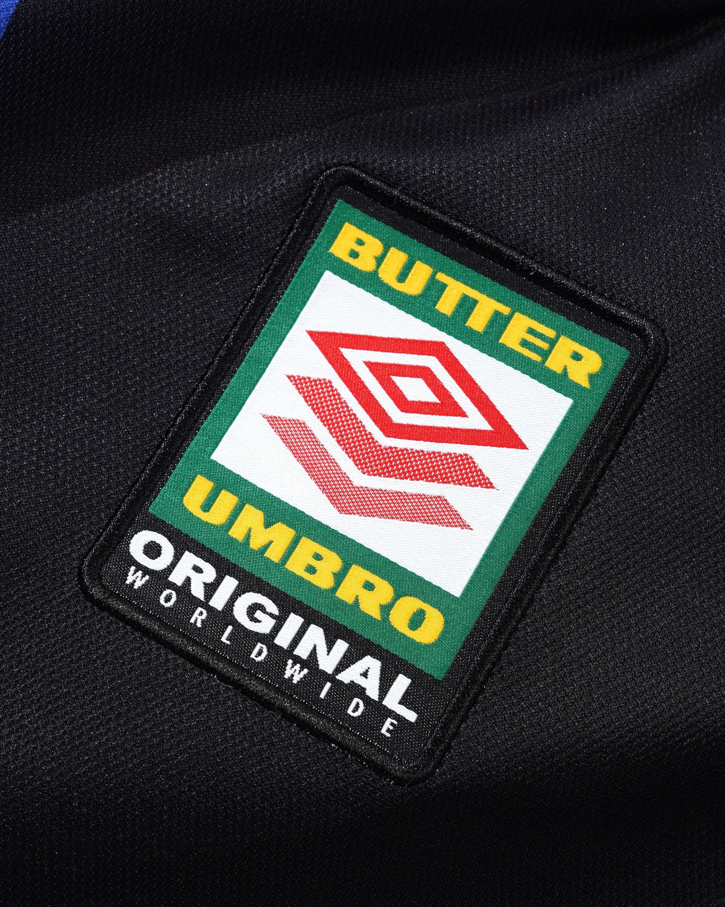 BUTTER GOODS | UMBRO Goalie L/S Jersey - Black/Blue